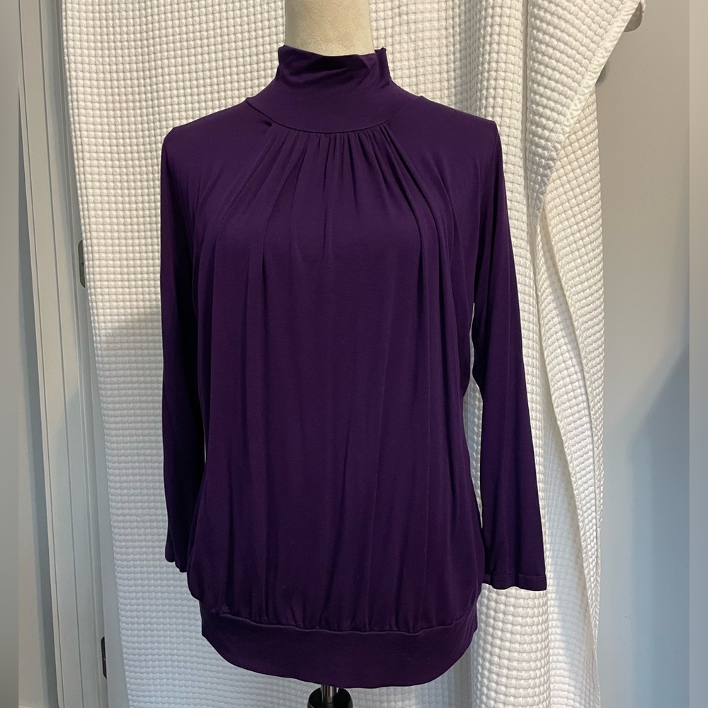 TUCR PLUS Purple shirt. Size 2XL.